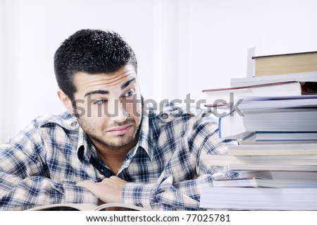 worried student looking books on white background, concept of concern