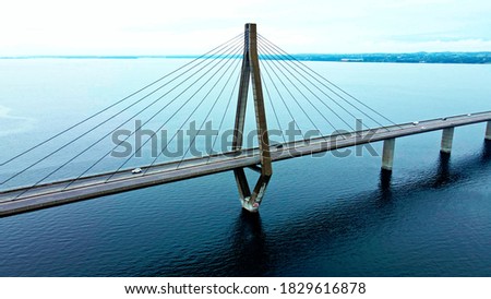 Similar – Image, Stock Photo Truck on suspension bridge over river