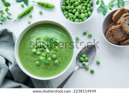 Similar – Foto Bild Leckere Erbsensuppe in Schüsseln auf dem Tisch