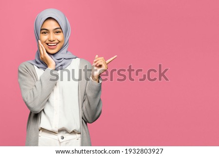 Similar – Image, Stock Photo Charming Arab woman in hijab looking at camera