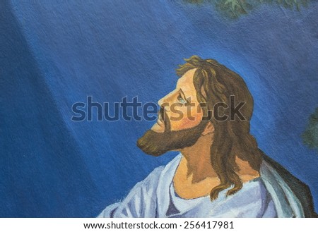 Jesus\'s face close-up while he was praying in the garden