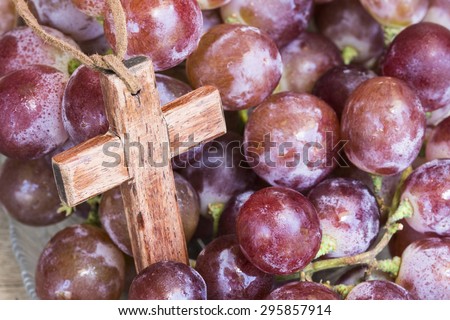 Wooden cross and grape, christian symbol Jesus is the true vine from bible verses John 15:1