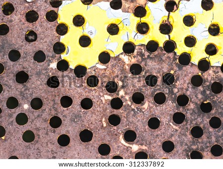 grunge  rusty metal with many hole and colorful old painted  texture  background