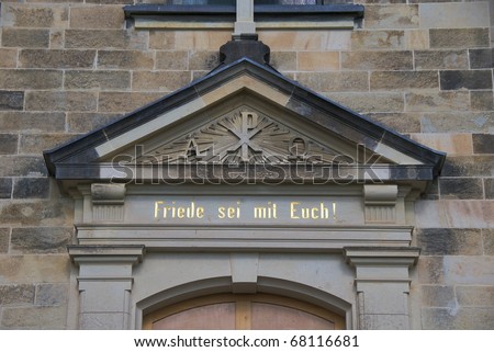\'Friede sei mit Euch!\' / \'Peace Be With You\' (John 14:27) above the door of Burg Stolpen in Saxon Switzerland, Germany