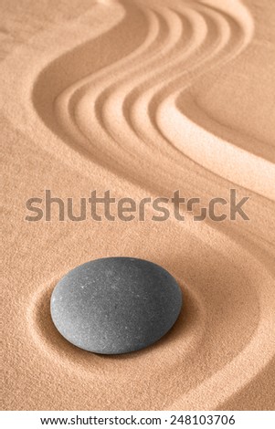 zen garden meditation stone background with copy space stones and lines in sand for relaxation balance and harmony spirituality or spa wellness Japanese culture