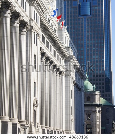 Column Front Building with Montreal Office Building as Background