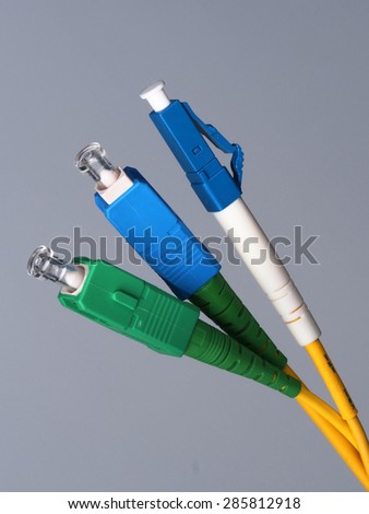 Three single fiber optic connectors used for indoor fiber optic network installation in Melbourne, Australia