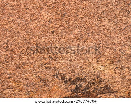 Background close-up of orange red dolomite rock near Alice Springs, red center, Australia June 2015