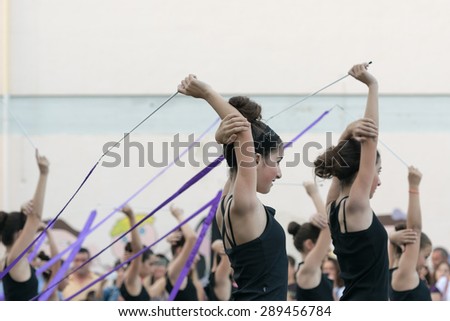 Date: 13/6/2015. Location: Public school in Athens Greece. School performance of training exercises with ribbons.