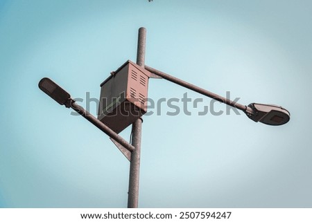 Similar – Foto Bild Straßenlampe und blauer Himmel auf der Straße