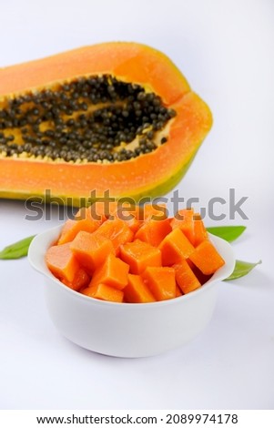 Fresh orange Papaya on white dish and papaya slice. Space for text ストックフォト © 