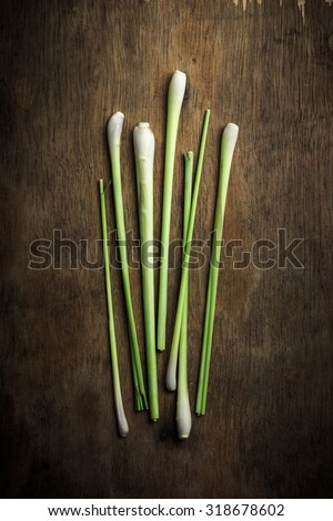 Lemongrass on rustic wood board background, Still life photography with lemngrass, The art of food photography with lemongrass on rustic wood board background