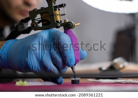 Similar – Image, Stock Photo Tattoo needle dipped in red paint