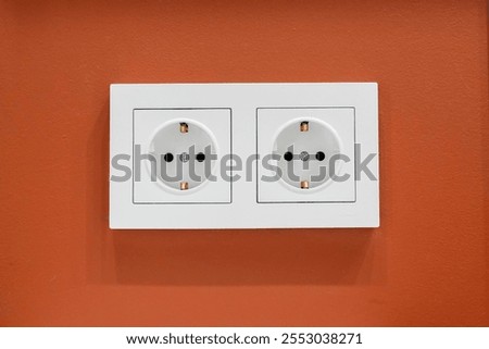 Similar – Image, Stock Photo A socket in a green tile wall: green electricity?