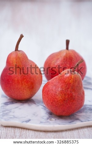 Fruit background. Fresh organic pears on bright background. Pear autumn harvest