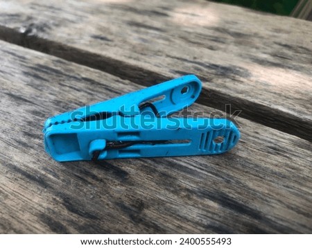 Similar – Image, Stock Photo Clothespin on rain wet clothesline