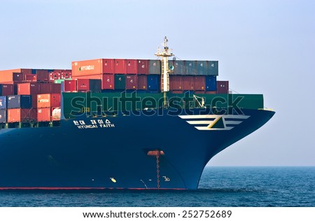 The bow of a huge container ship Hyundai Faith anchored. Nakhodka Bay. East (Japan) Sea. 19.04.2014