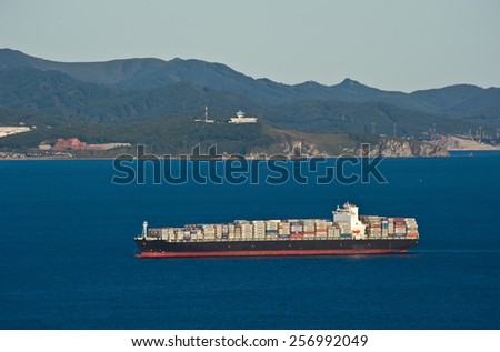 Large container ship loaded at anchor in the roads. Nakhodka Bay. East (Japan) Sea. 17.09.2014