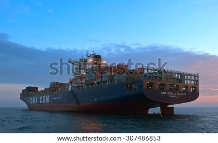 Container ship CMA CGM La Traviata standing on the roads at anchor. Nakhodka Bay. East (Japan) Sea. 05.08.2015