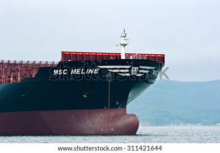 The bow of a huge container ship  MSC Meline at anchored in the roads. . Nakhodka Bay. East (Japan) Sea. 22.07.2015
