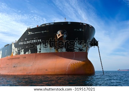 The bow of a huge bulk carrier FMG Cloudbreak at anchored in the roads. Nakhodka Bay. East (Japan) Sea. 17.09.2015