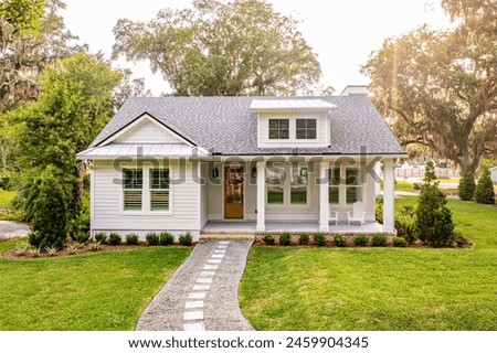 Similar – Image, Stock Photo Roof of a cottage with roof damage. Shingled with Eternit panels. Problem material asbestos.