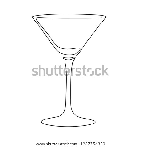 Empty martini glass with thin stem.