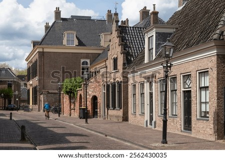 Similar – Image, Stock Photo City stroll with shuttered shop windows and a curve