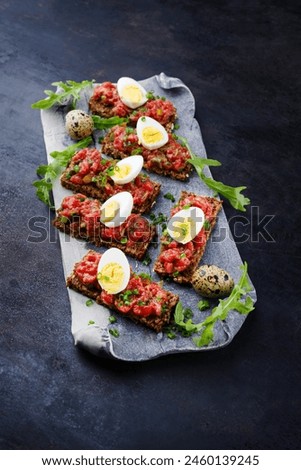 Similar – Image, Stock Photo Gourmet canapes of raw Iberian ham.