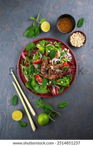 Similar – Image, Stock Photo Beef thai salad served on dish