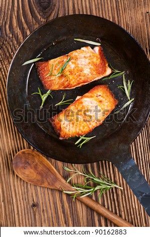 salmon steaks in the iron pan
