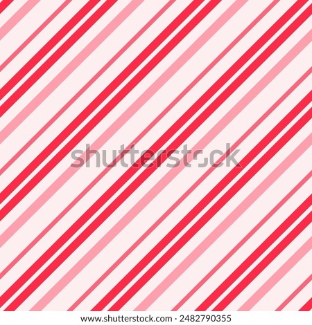 Christmas red diagonal stripes seamless pattern. Candy cane striped background.