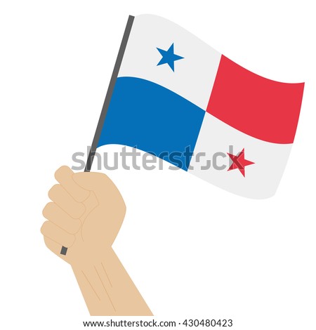 Hand holding and raising the national flag of Panama