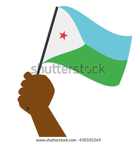 Hand holding and raising the national flag of Djibouti