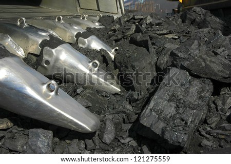 mining, coal loading, black coal, work in a face, the excavator,
