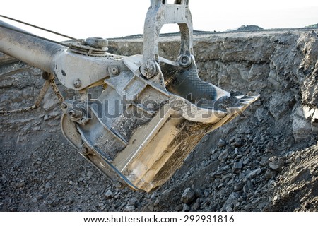 excavator loading of coal, power, powerful, push land, machinery, mining, black gold, shipping coal, earth,