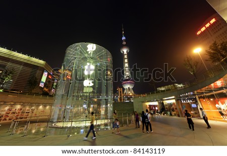 SHANGHAI-AUGUST 16: Night View of Apple store on August 16, 2011 in Shanghai, Pudong District. This is China\'s second Apple store opened on July 10, 2010.