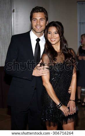 Eric Winter and Roselyn Sanchez at the Operation Smile\'s 8th Annual Smile Gala held at the Beverly Hilton Hotel in Beverly Hills, USA on October 2, 2009.