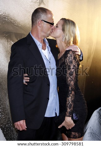 HOLLYWOOD, CA - SEPTEMBER 06, 2011: Gavin O\'Connor and Brooke Burns at the Los Angeles premiere of \'Warrior\' held at the ArcLight Cinemas in Hollywood, USA on September 6, 2011.