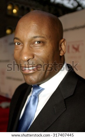 John Singleton at the 75th Diamond Jubilee Celebration for the USC School of Cinema-Television held at the USC\'s Bovard Auditorium in Los Angeles, USA on September 26, 2004.
