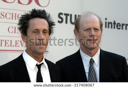 Brian Grazer and Ron Howard at the 75th Diamond Jubilee Celebration for the USC School of Cinema-Television held at the USC\'s Bovard Auditorium in Los Angeles, USA on September 26, 2004.