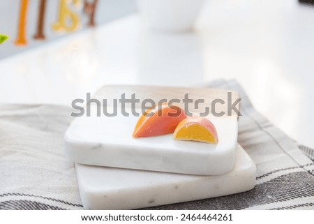 Similar – Image, Stock Photo Ball shaped dessert on plate