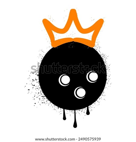 Bowling ball and crown with spray paint graffiti