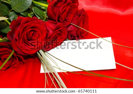 red roses and invitation card