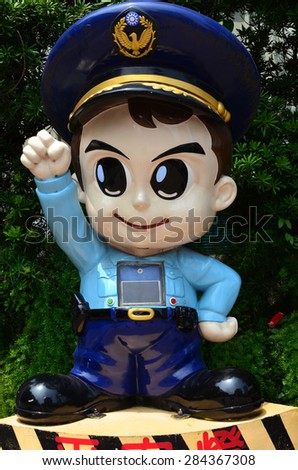 April 2015, Hsin-chu City,Taiwan. The city set some cute police statues. There are two buttons and a monitor on the statue. City citizens can contact police office directly if any emergency.