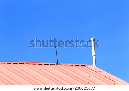 Lightning rod against blue sky