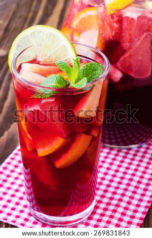 Refreshing summer drink with lots of different fruits