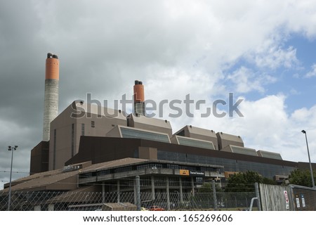 HUNTLEY, NEW ZEALAND - NOVEMBER 30; Genesis Thermal Power Station, Huntley. New Zealand with two smoke-stacks against cloudy sky, November 30, 2013. New Zealand is renown for thermal power generation