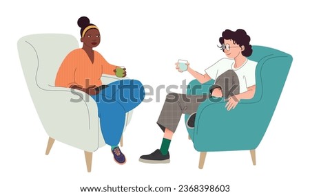 A man and a woman talking sitting in armchairs. Communication concept. Relaxed conversation between two people. Dialogue between coworkers, friends, or colleagues. Conversation between people.