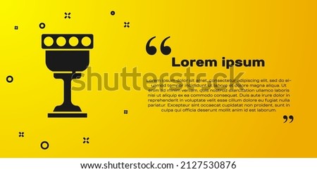 Black Medieval goblet icon isolated on yellow background. Holy grail.  Vector